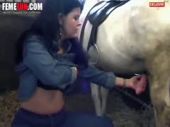 On a powerful black horse, a seductive amateur coed showcases her cock-sucking prowess.
